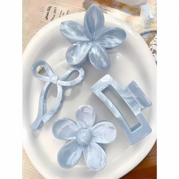 Blå marmorerade hårklämmor presentask – 4 st