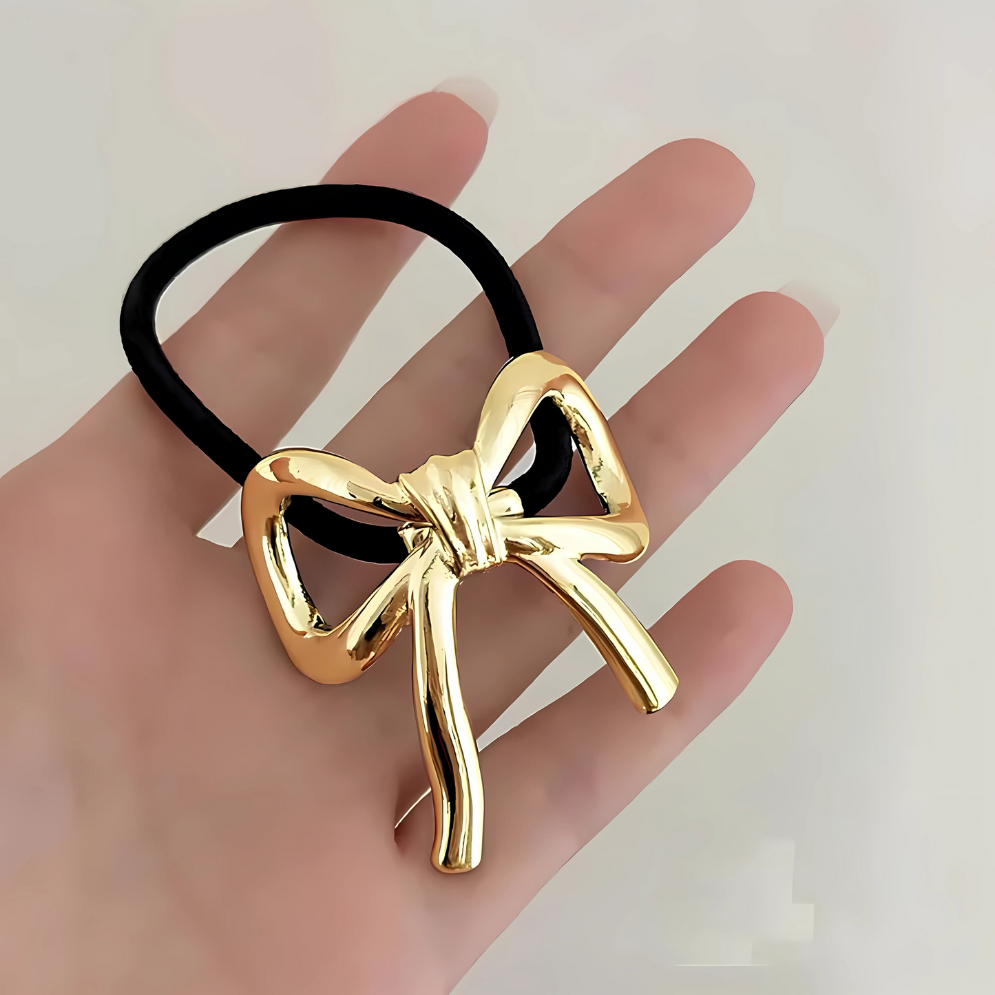 Hair ties with gold and silver metal decoration