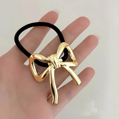 Hair ties with gold and silver metal decoration
